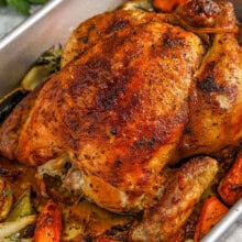 pan of cooked chicken and veggies to show How to Prepare a Whole Chicken