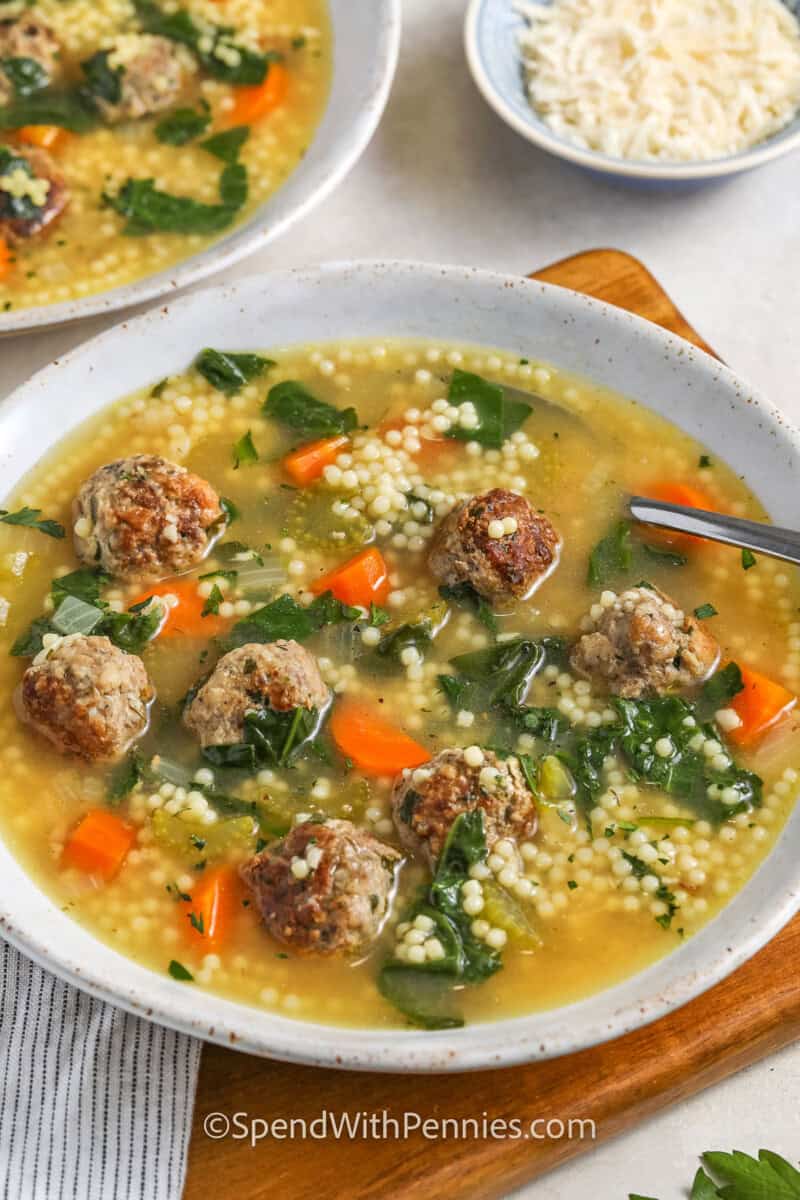 bowls of Italian Wedding Soup with parmesan
