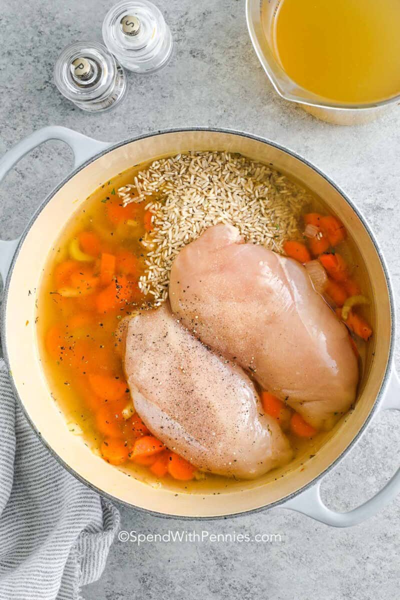 ingredients in a pot for chicken for chicken and rice soup.