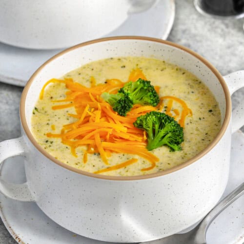 Broccoli Cheddar Soup in a bowl with garnish