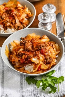 two bowls of ground beef and cabbage