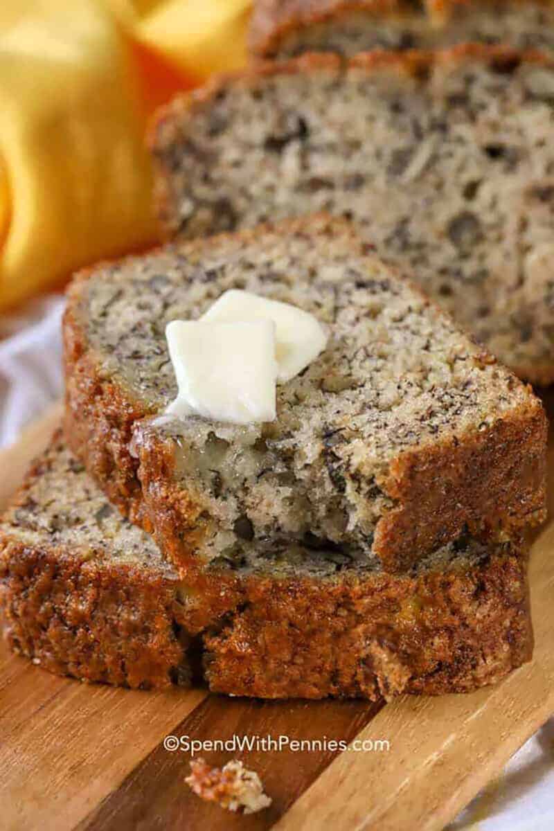 stacked slices of banana bread with cubes of butter