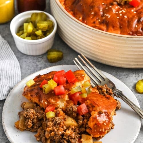 plated Cheeseburger Pot Pie with a pan full in the back