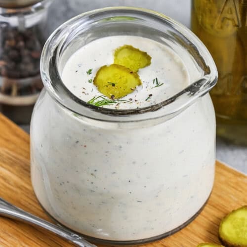 jar of Dill Pickle Ranch Dressing with a spoon full