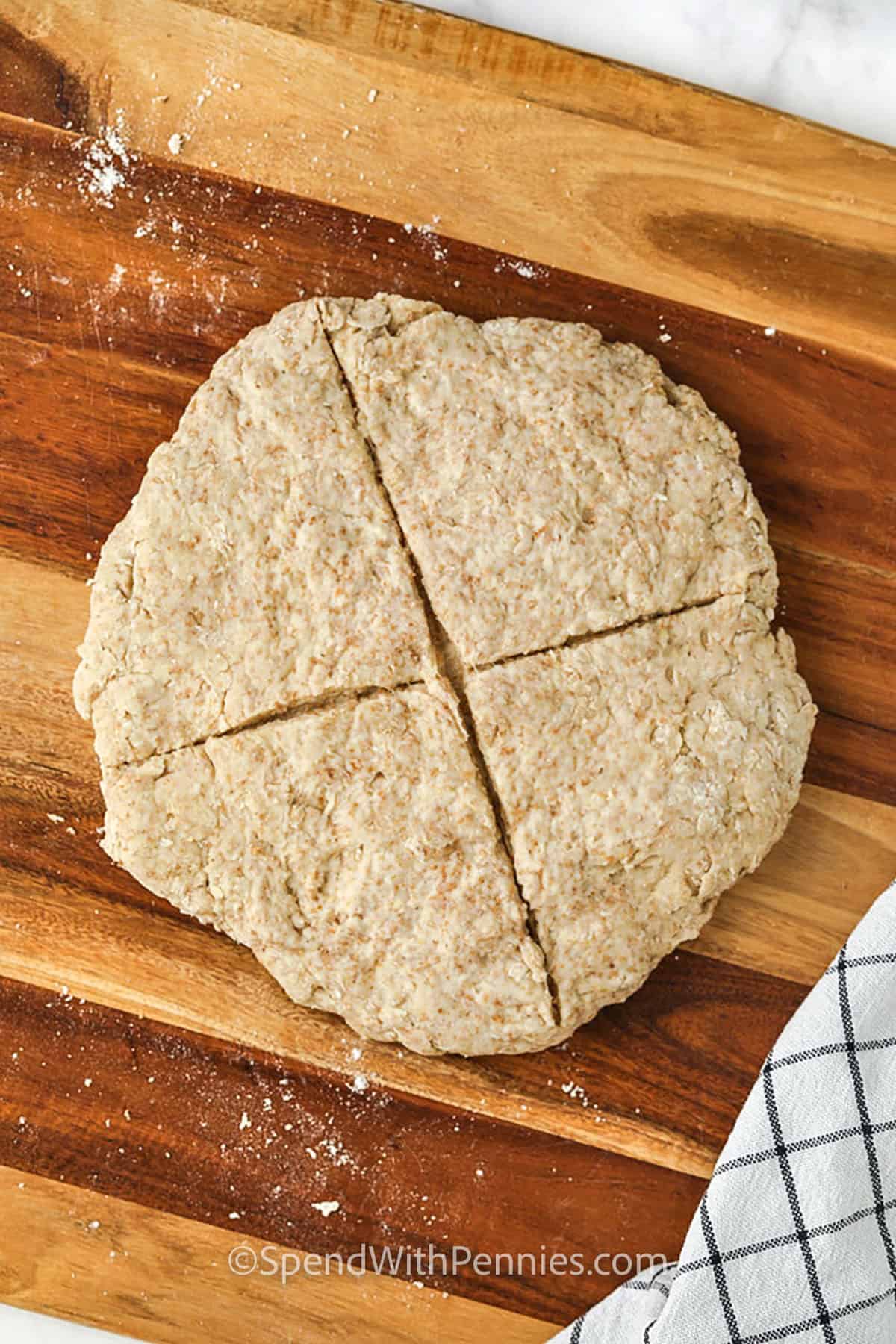 a scored loaf of Irish soda bread