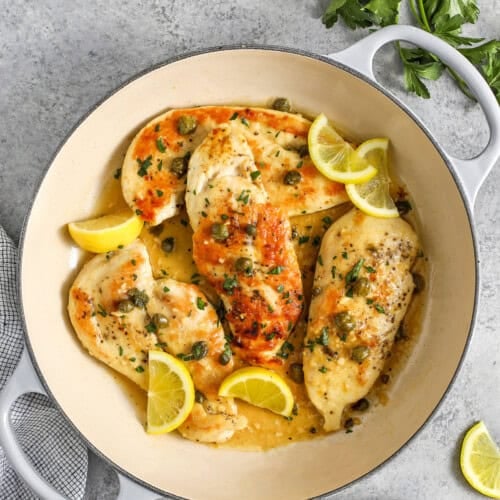pan full of Chicken Scallopini in creamy lemon sauce