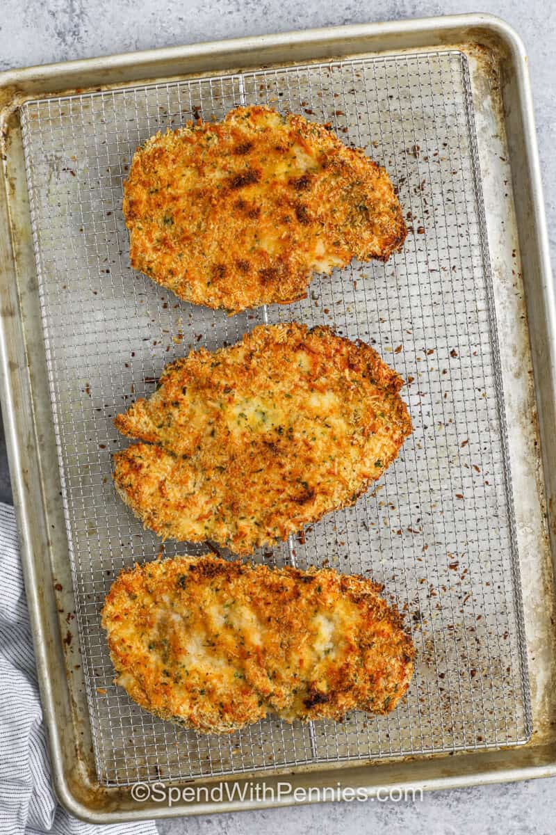 Crispy Parmesan Crusted Chicken cooked on a sheet pan