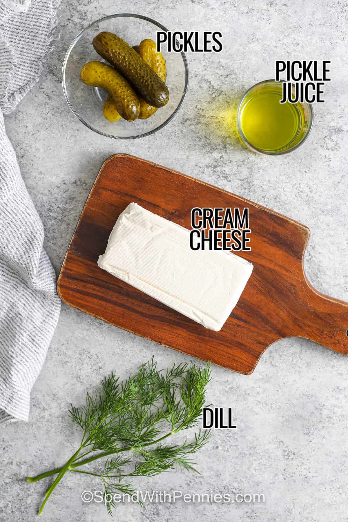 Dill pickle dip is a creamy, tangy appetizer that’s perfect for pickle lovers and party trays alike. Made with cream cheese, sour cream, chopped dill pickles, and a touch of garlic and dill, this easy dip is bursting with bold flavor. It pairs perfectly with chips, crackers, or fresh veggies and comes together in just minutes. Make it ahead and chill for even more flavor in every bite. #spendwithpennies pickles , pickle juice , cream cheese, dill with labels to make 4 Ingredient Dill Pickle Dip