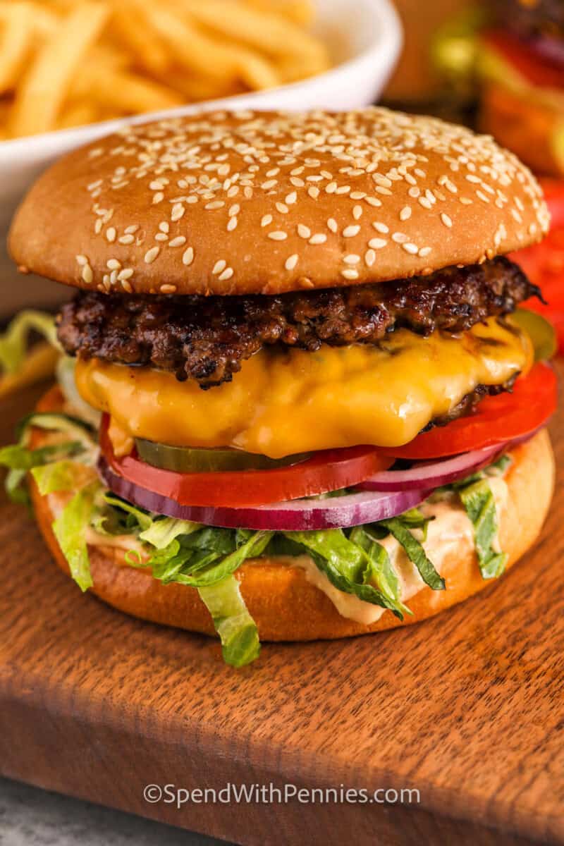 Smash Burgers with cheese and a plate of fries