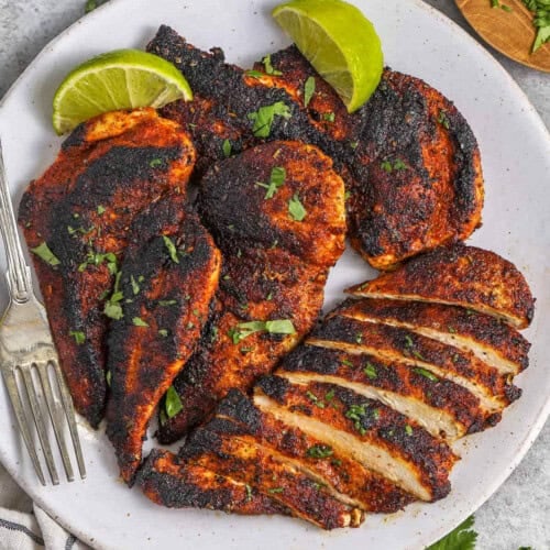 plate of Blackened Chicken with one piece sliced
