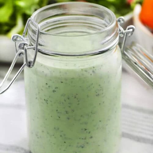 green goddess dressing in a glass jar