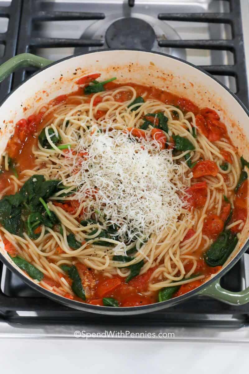 parmesan cheese and pasta in a Dutch oven for One Pot Spaghetti