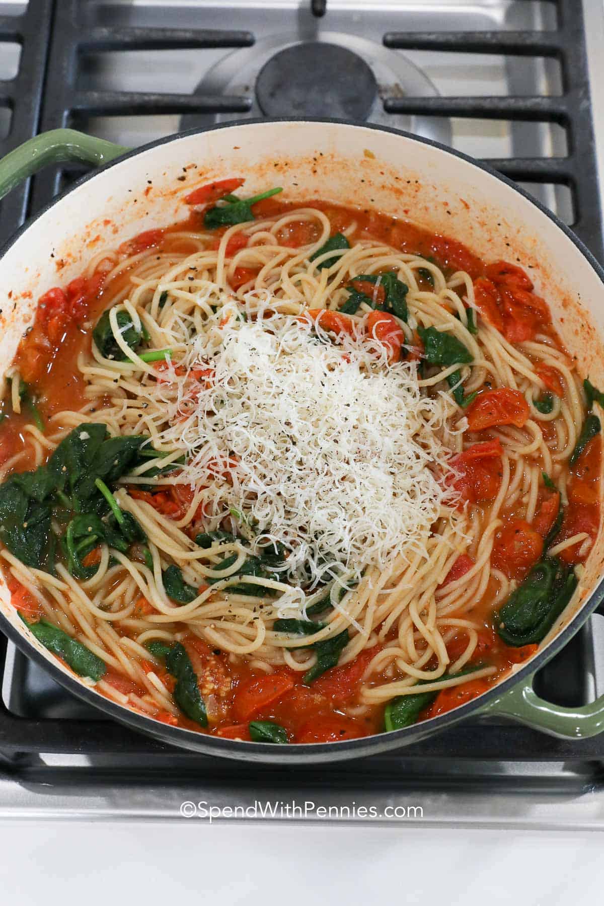 parmesan cheese and pasta in a Dutch oven for One Pot Spaghetti