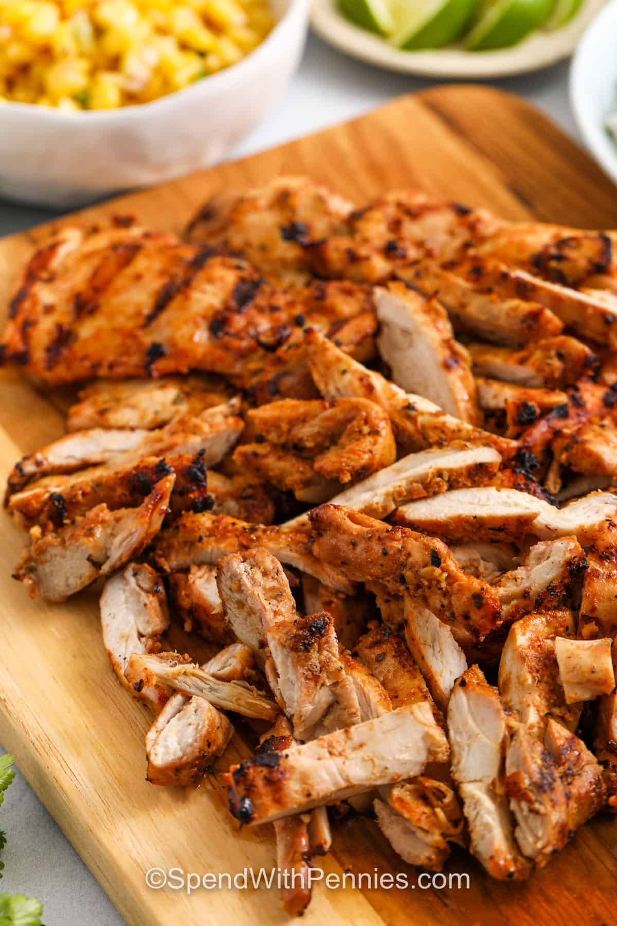 chipotle chicken sliced on a cutting board