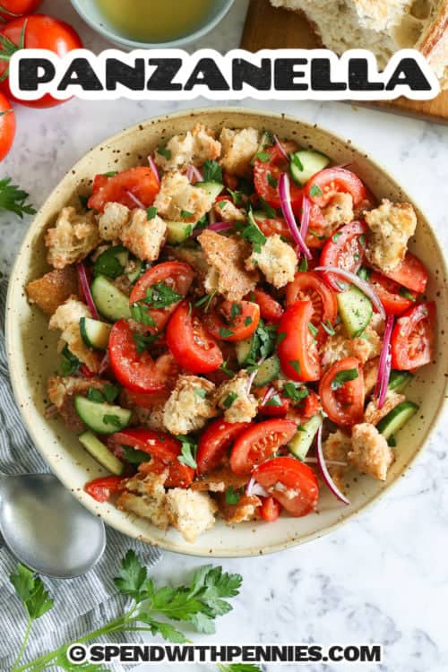 panzanella salad in a bowl with writing