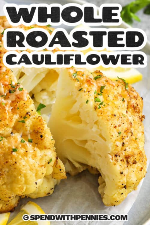 closeup of whole roasted cauliflower cut into bites, with writing