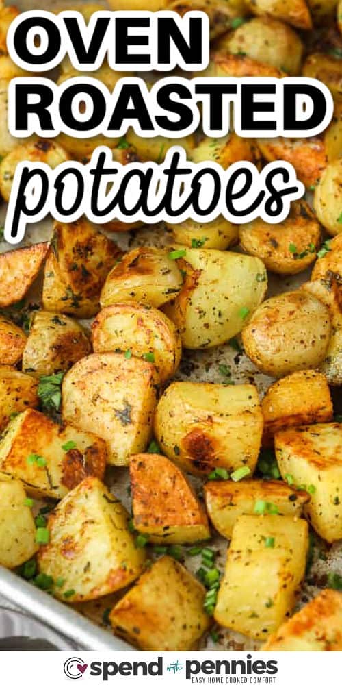 These oven roasted potatoes are coated with garlic, herbs, and a touch of paprika for a flavorful and easy side dish. Roasting them in the oven makes the outsides crispy while the insides stay soft and fluffy. Use any herbs you have on hand—fresh or dried both work well. They’re tasty enough for guests but easy enough for weeknights. #spendwithpennies oven roasted potatoes in a metal pan with writing