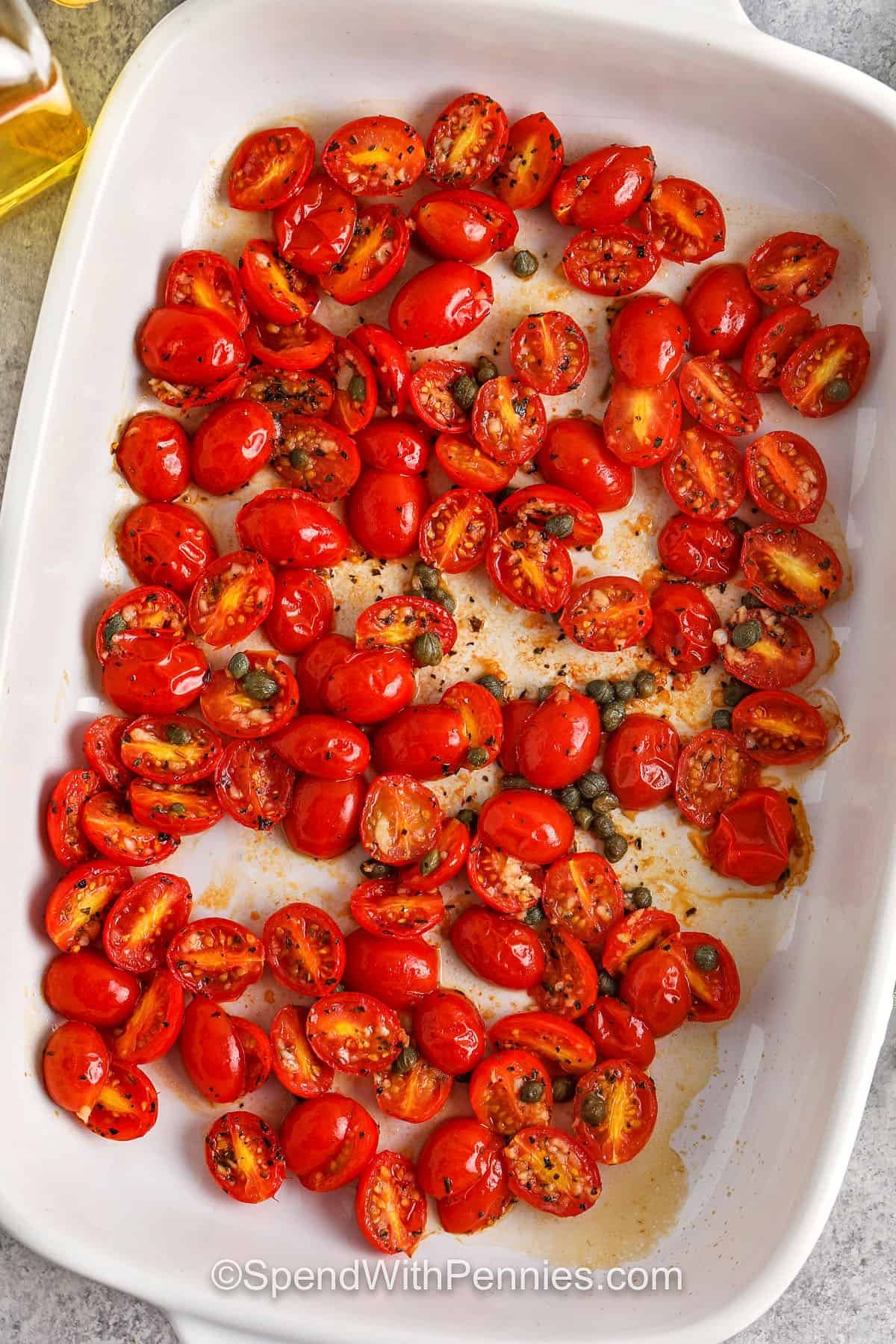 Grilled cod with tomatoes is a single dish wonder that makes weekend dinners easy and elegant. The tender cod is baked perfectly, with a blend of tomatoes, garlic and capers. The touch of lemon and herbs brings brightness, while the butter adds richness. This dish is wholesome, delicious, and can be ready in 30 minutes and can be perfect for any occasion. #spendwithpennies Tomatoes and capers, making roasted cod with tomatoes in dishes