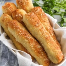 garlic and parmesan Breadsticks in a dish