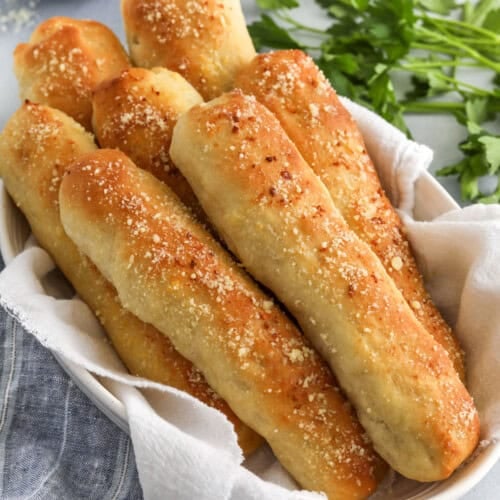 garlic and parmesan Breadsticks in a dish