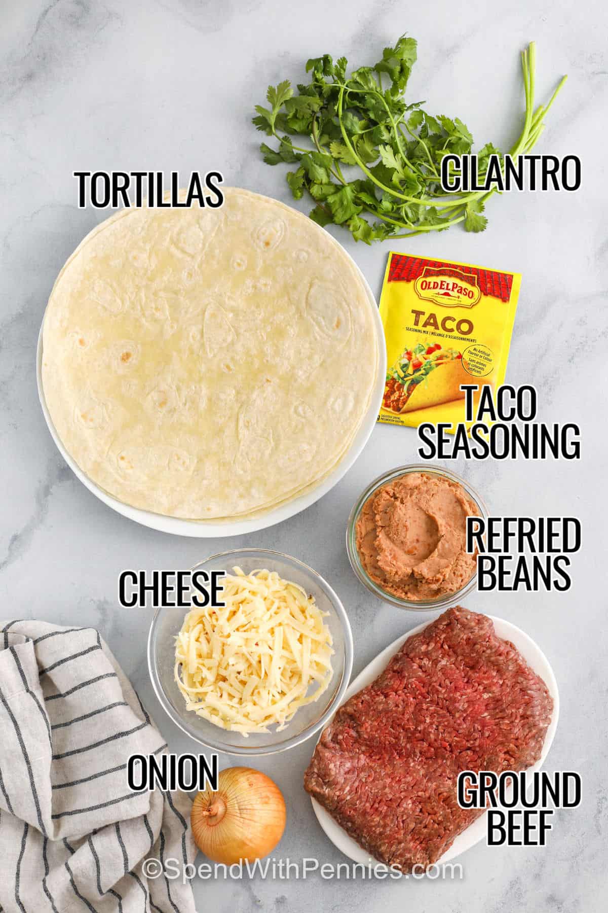This favorite beef burrito recipe is packed with flavor and so easy to make. Lean ground beef is cooked with taco seasoning and onions until perfectly tender, then wrapped in warm tortillas with creamy refried beans and melty pepper jack cheese. Add fresh cilantro for a pop of brightness. Toast the burritos in a skillet for a golden, crispy finish. They’re filling, flavorful, and freezer-friendly—perfect for meal prep or busy nights! #spendwithpennies tortillas , cilantro , taco seasoning , refried beans , cheese , onion , ground beef with labels to make Beef Burrito Recipe