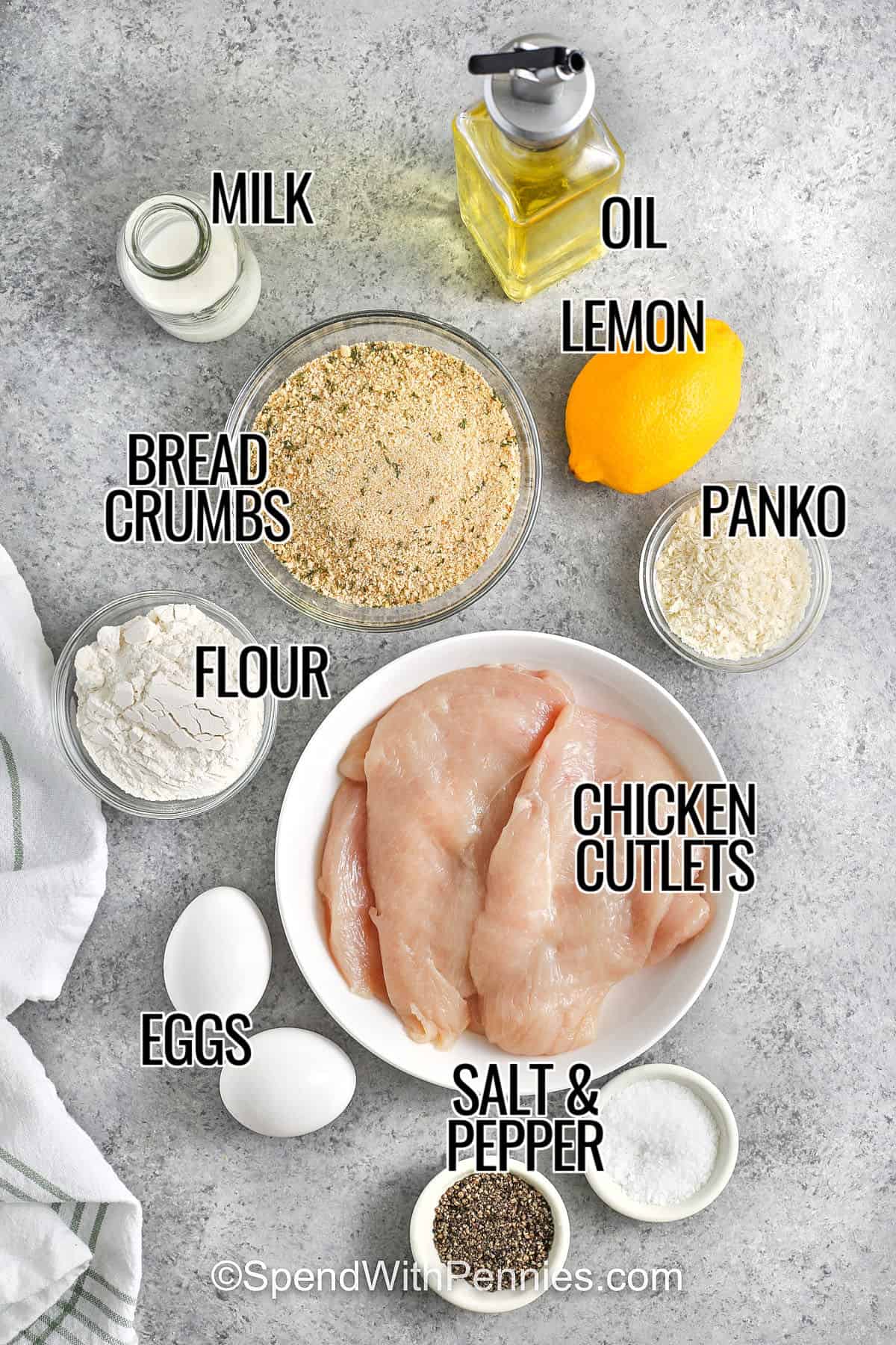 milk , oil , bread crumbs , lemon , panko , flour , chicken cutlets , eggs , salt and pepper with labels to make Chicken Milanese