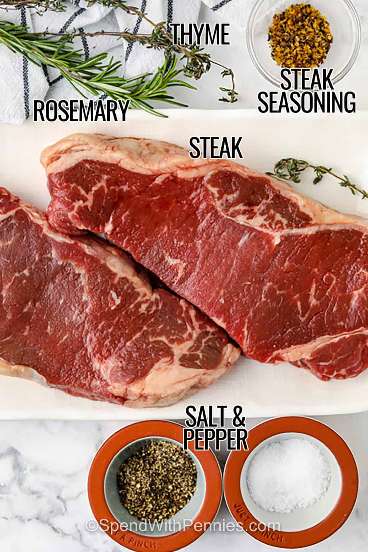 Cooking juicy steak in the oven starts with a quick pan-sear and finishes in the oven for tender, flavorful results. These ribeye steaks are seasoned simply and cooked to perfection, then topped with butter for extra richness. A creamy pan sauce with garlic, herbs, and a splash of red wine takes them over the top. Resting the steaks keeps them juicy and tender. #spendwithpennies steak , rosemary , thyme , steak seasoning , salt and pepper with labels to make Juicy Oven Steak