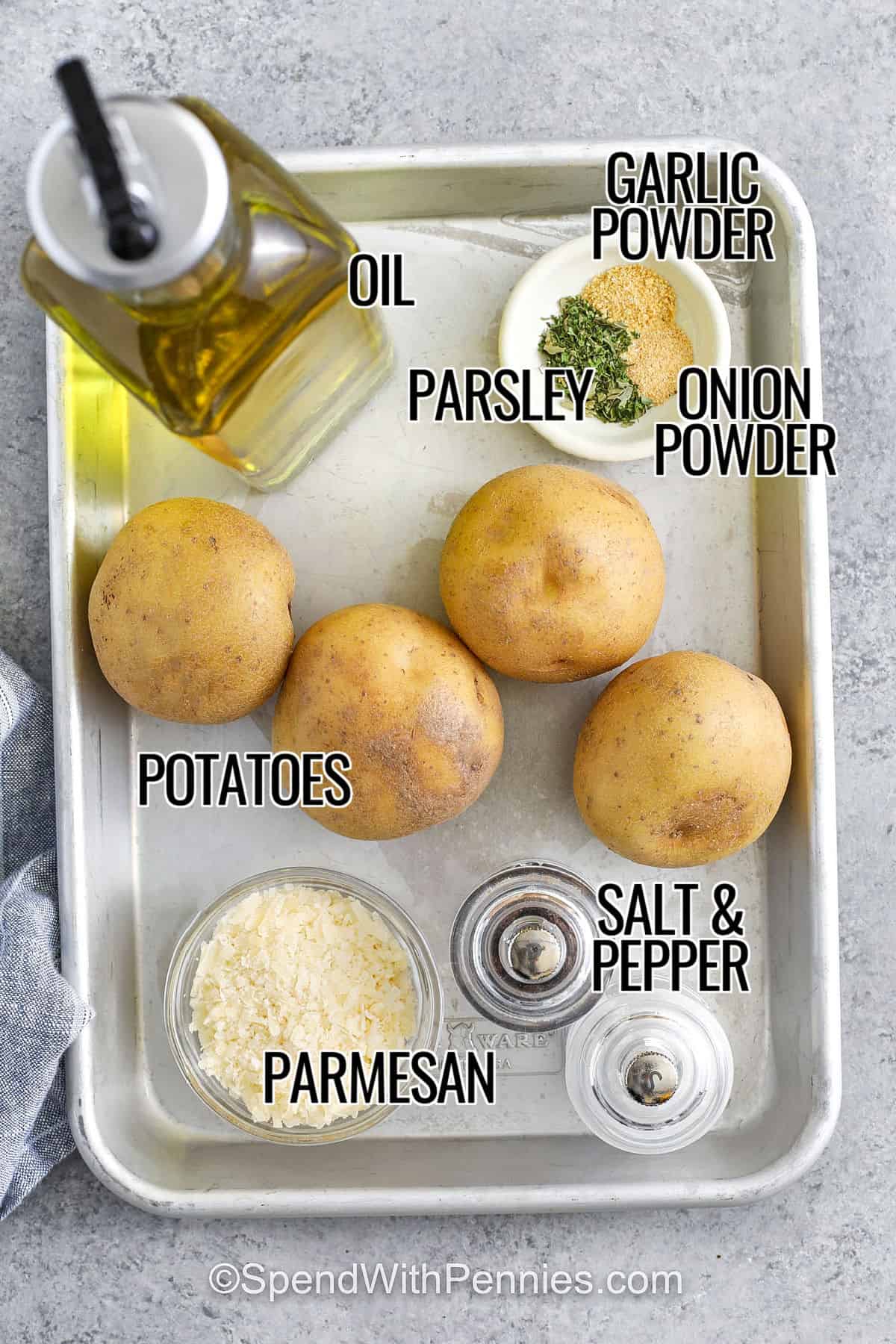 potatoes , parmesan , oil , parsley , onion powder , garlic powder , salt and pepper with labels to make Oven Baked Potato Slices