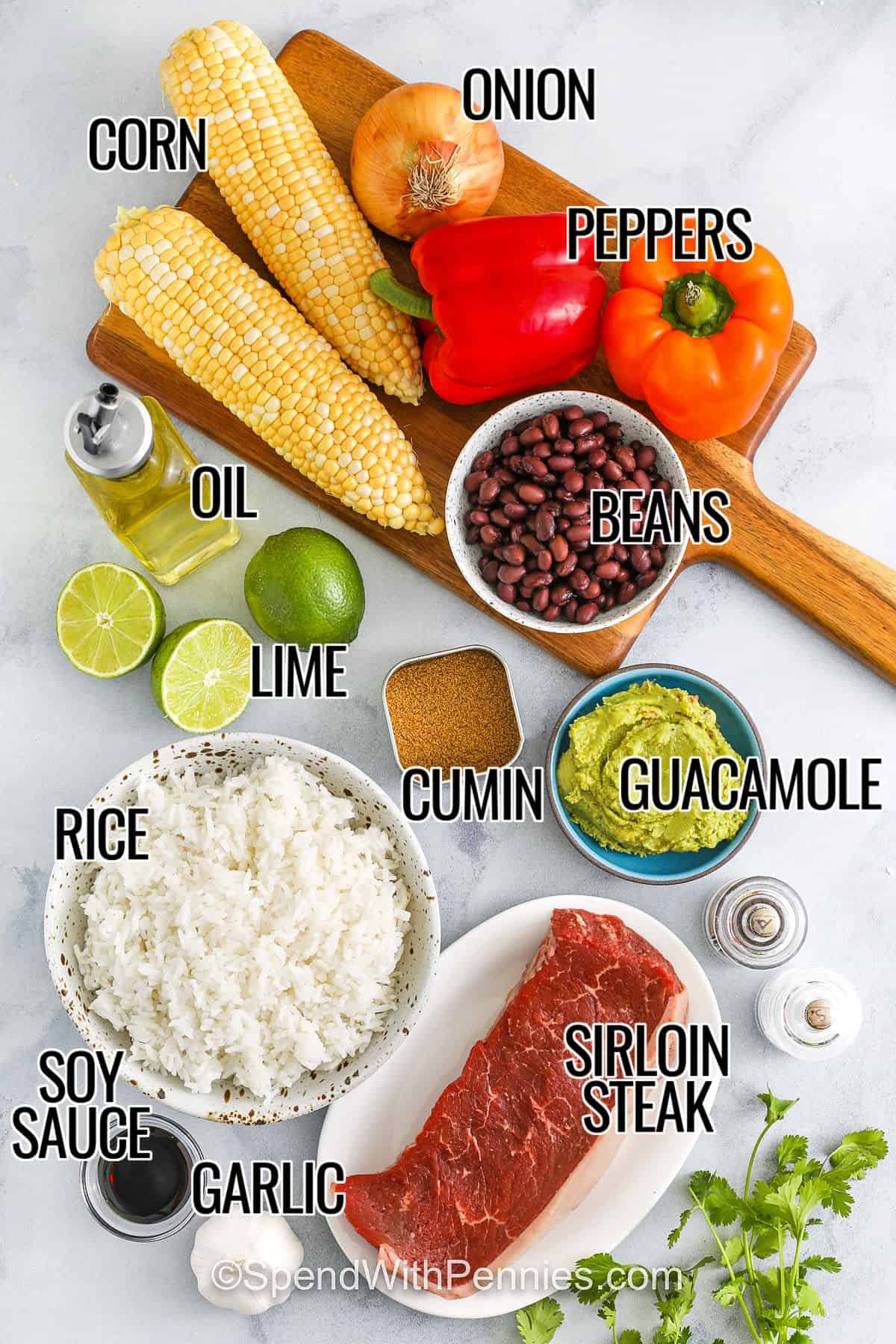 corn , onion , peppers , beans , oil , lime , cumin , guacamole , rice , soy sauce , garlic and sirloin steak with labels to make Steak Bowls