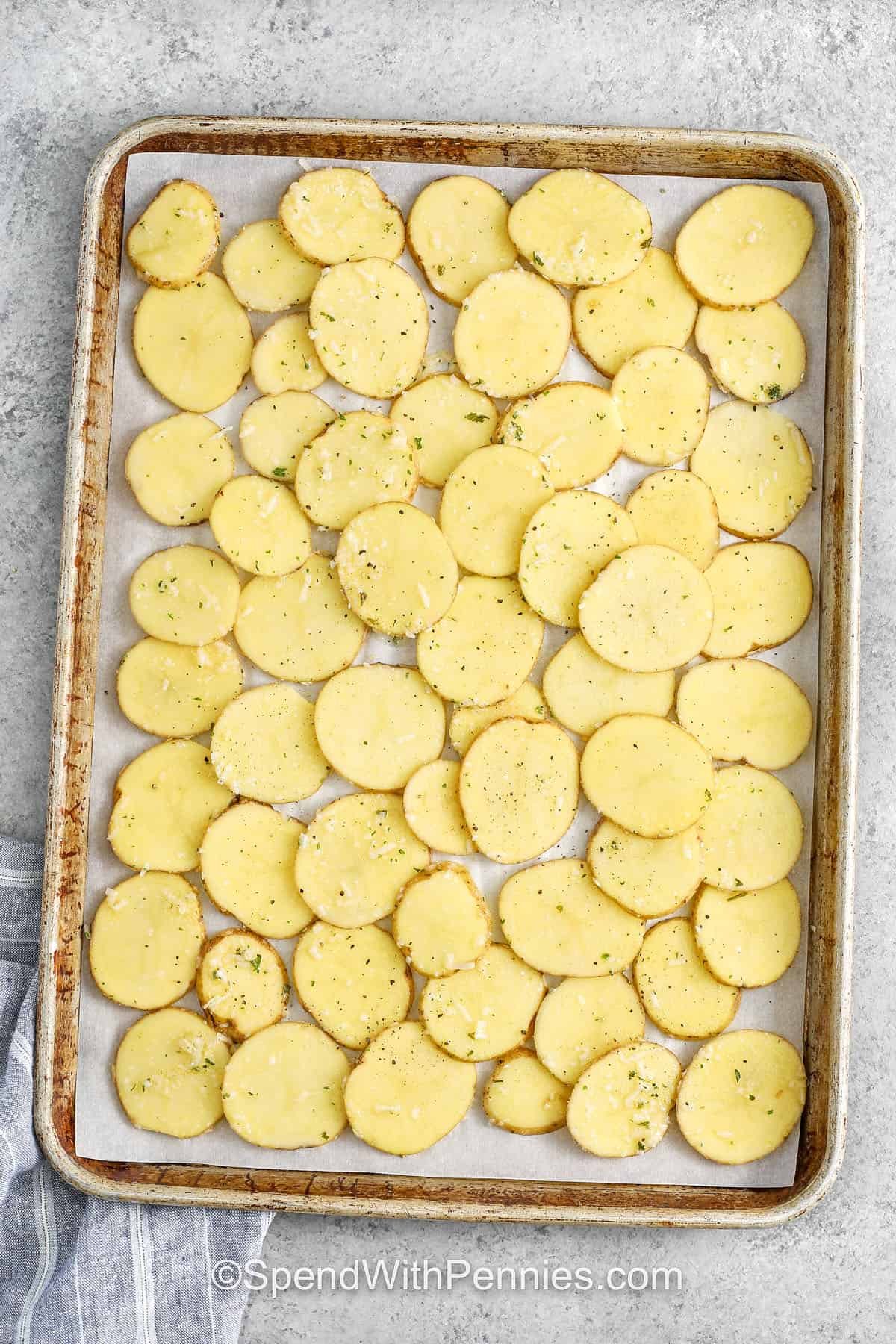 Oven Baked Potato Slices on a sheet pan before cooking
