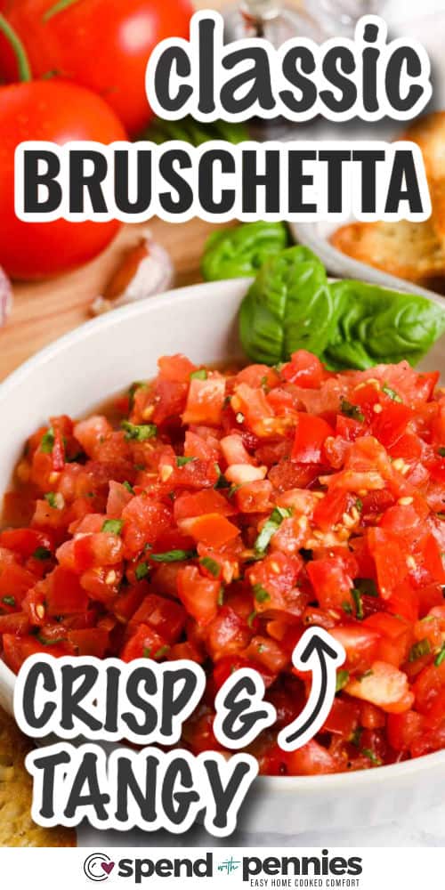 Tomato bruschetta brings garden-fresh ingredients together for a quick, easy, and elegant appetizer. The mix of chopped tomatoes, basil, and garlic is loaded with flavor and texture, and pairs perfectly with toasted slices of baguette. It’s light, refreshing, and perfect for entertaining or enjoying on a sunny patio. #spendwithpennies crisp and tangy Bruschetta with writing