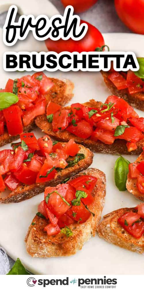 Tomato bruschetta is the ultimate crowd-pleasing starter with simple ingredients and bold flavor. Ripe tomatoes, fresh basil, and a touch of garlic are tossed in olive oil and spooned generously over crispy toast. A drizzle of balsamic adds a tangy finish that takes it to the next level. It’s a bright, beautiful appetizer ready in minutes. #spendwithpennies fresh Bruschetta with a title