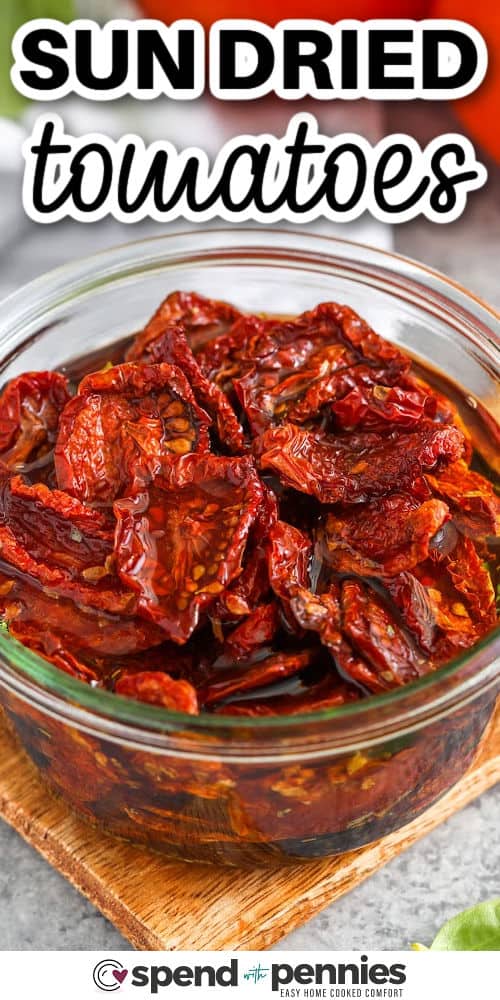 There’s nothing like the bold, savory punch of sun dried tomatoes, and this simple recipe brings it home with just a handful of ingredients. Slice tomatoes evenly, slow roast for hours, then finish in olive oil and basil for classic flavor. The texture is chewy, not brittle, and the taste is robust. Add to creamy dips, grilled sandwiches, or grain bowls for a pop of sun-kissed flavor! #spendwithpennies close up of Sun Dried Tomatoes with a title