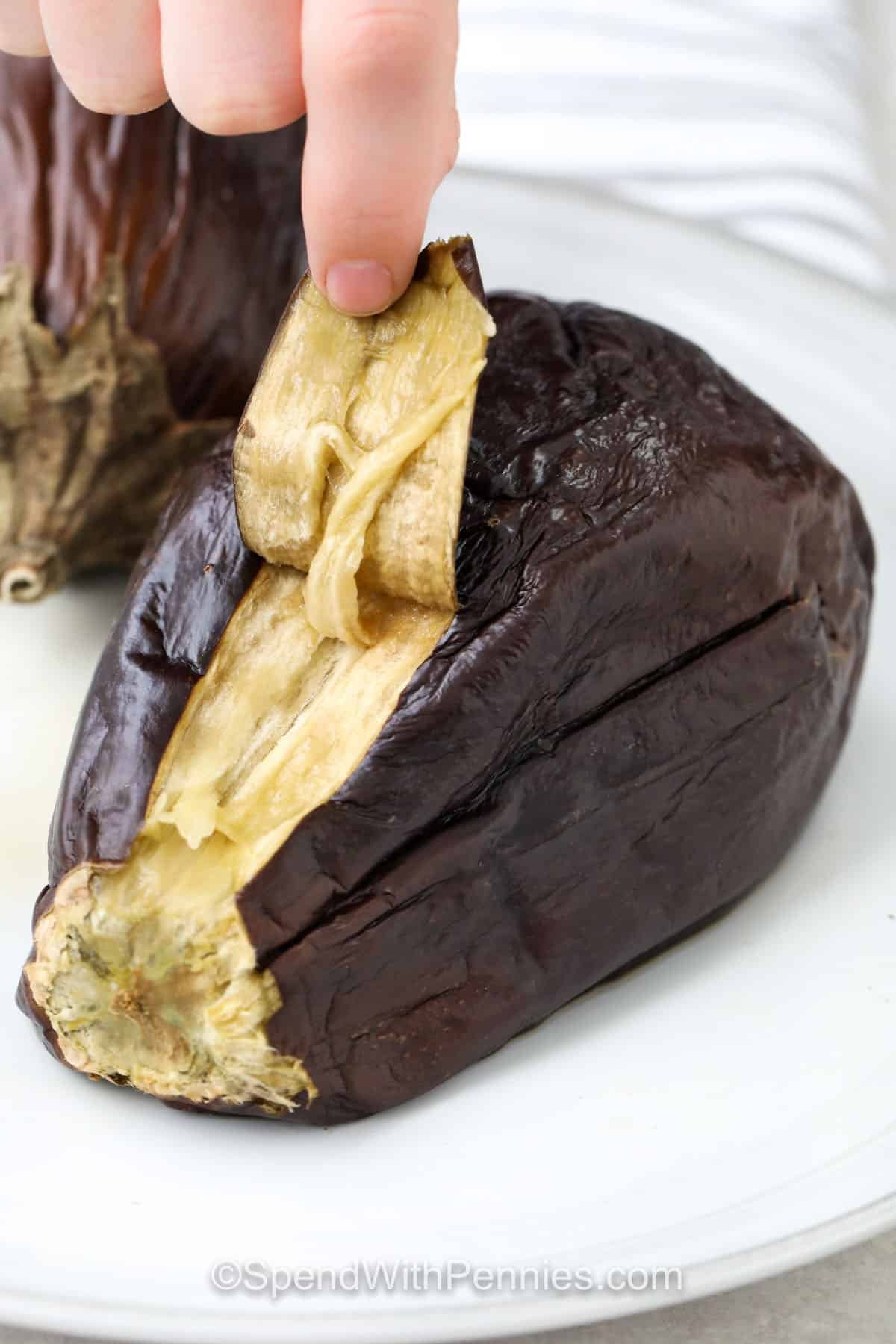 peeling eggplant to make Easy Baba Ganoush