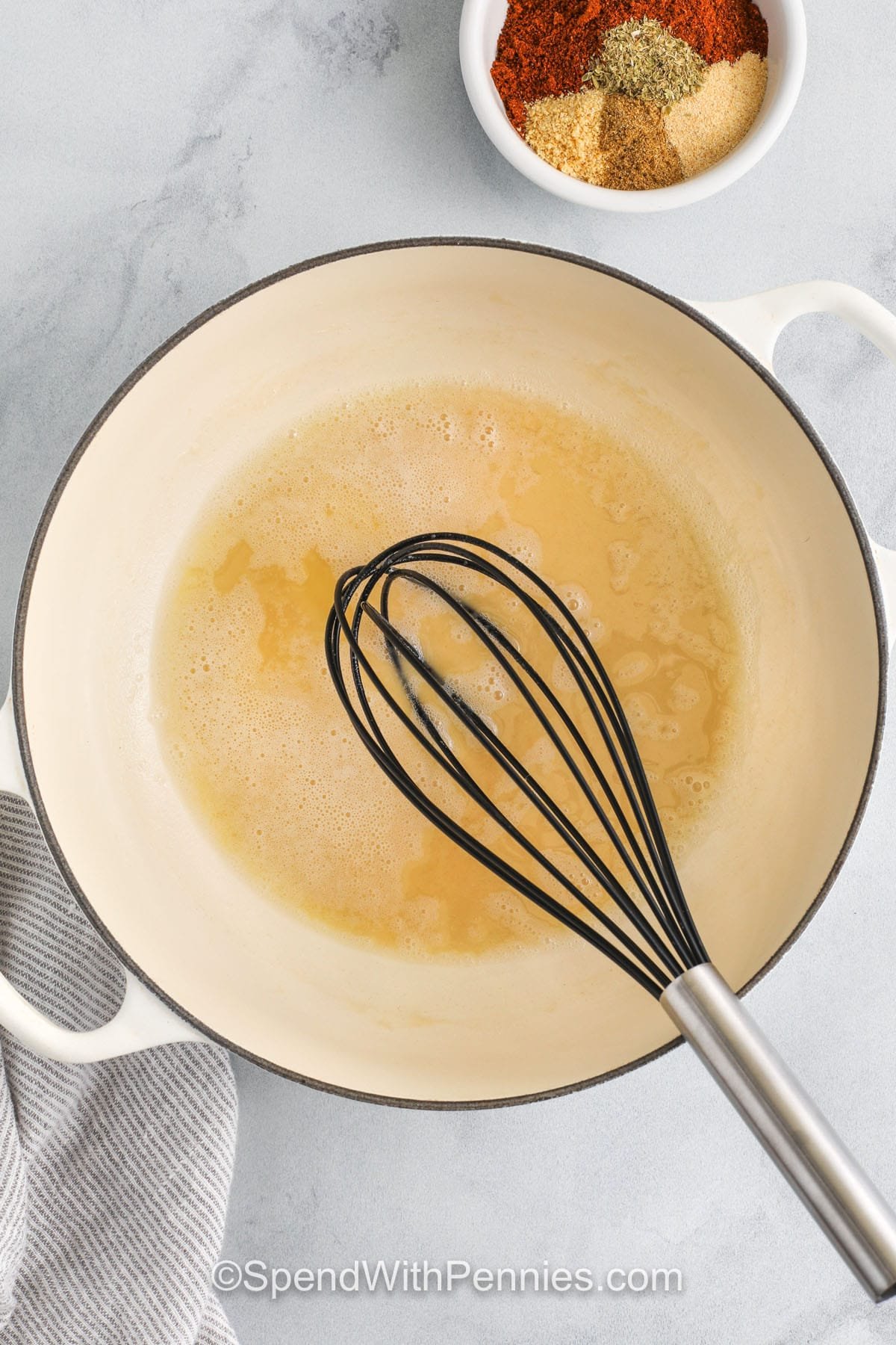 preparing a roux to make Enchilada Sauce