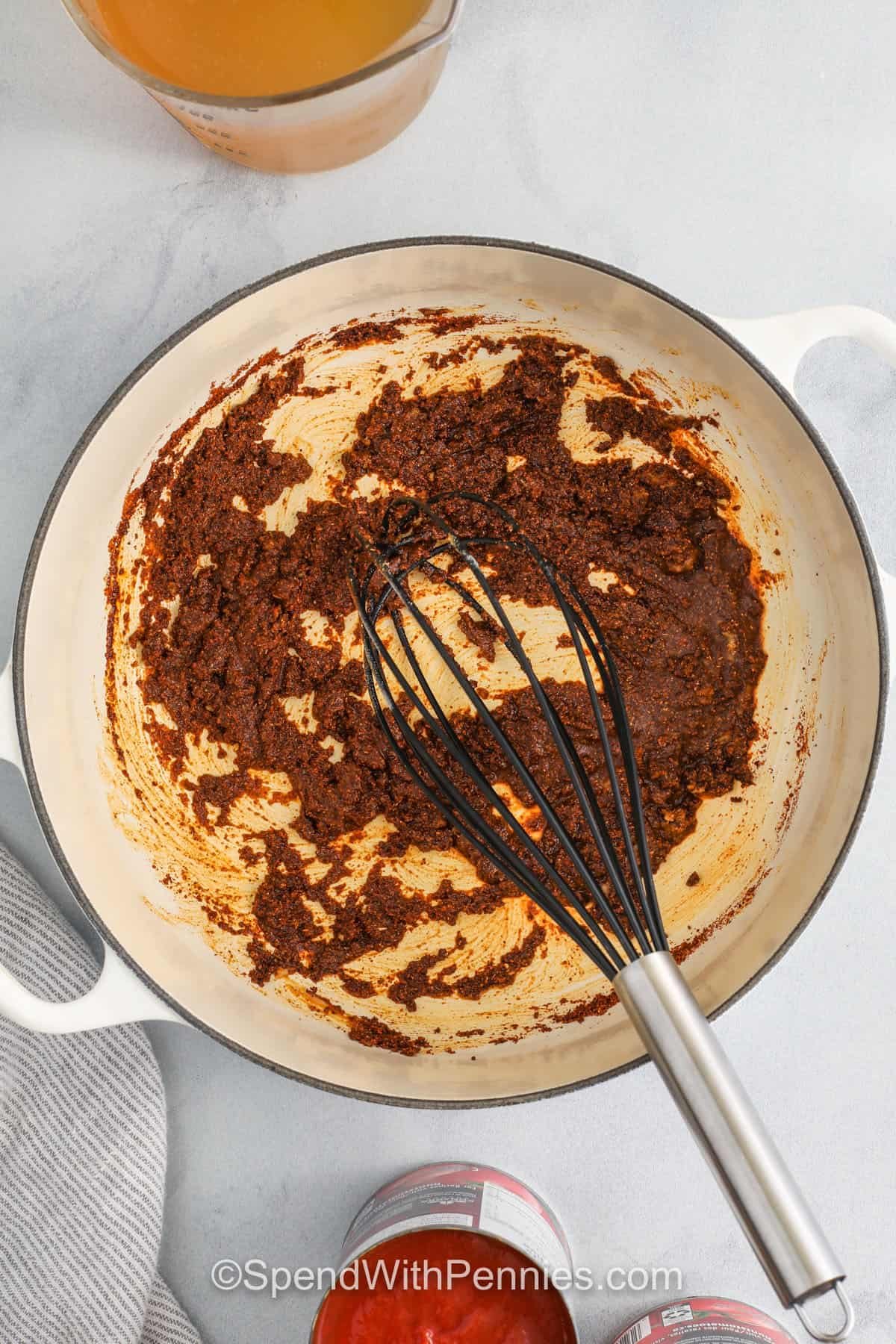 adding chili powder to roux to make Enchilada Sauce