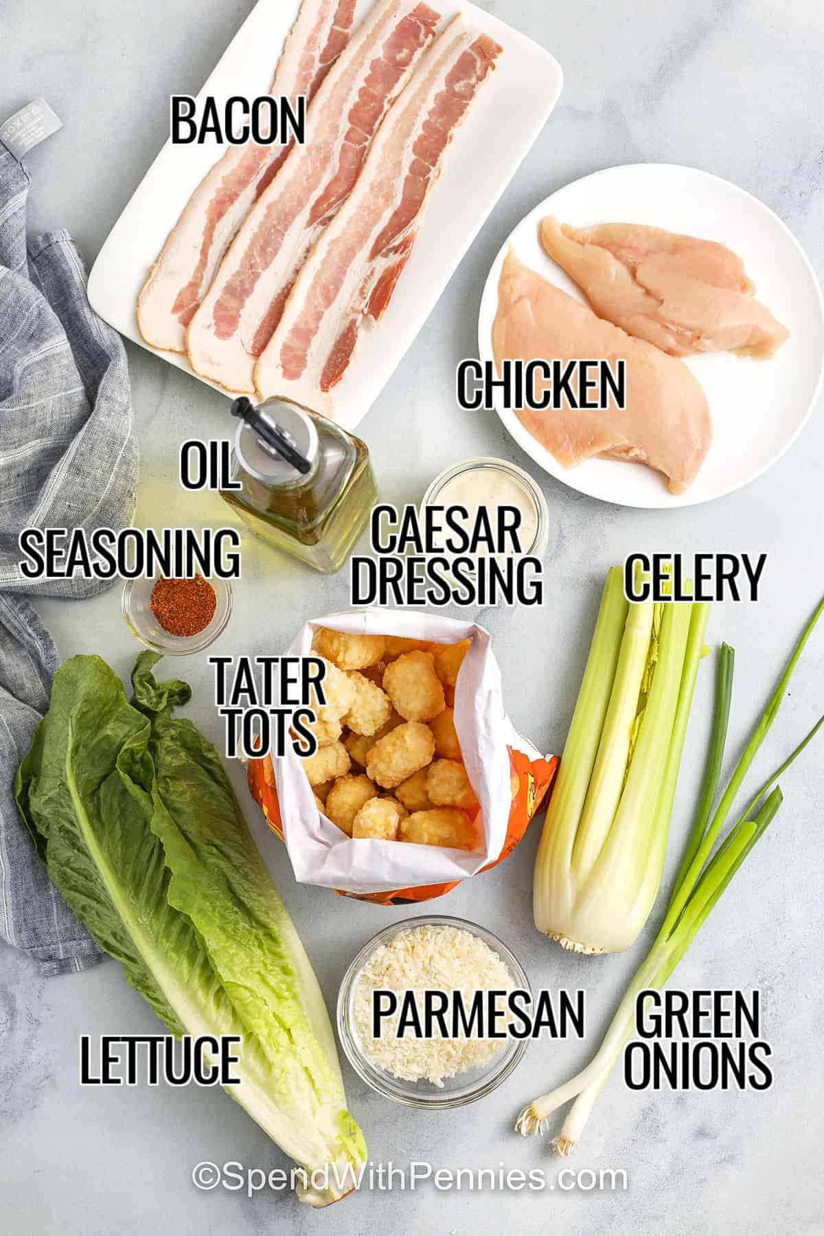 bacon , chicken , oil , seasoning , lettuce , tater tots , parmesan , green onions , celery , caesar dressing , with labels to make Crispy Tater Caesar Salad