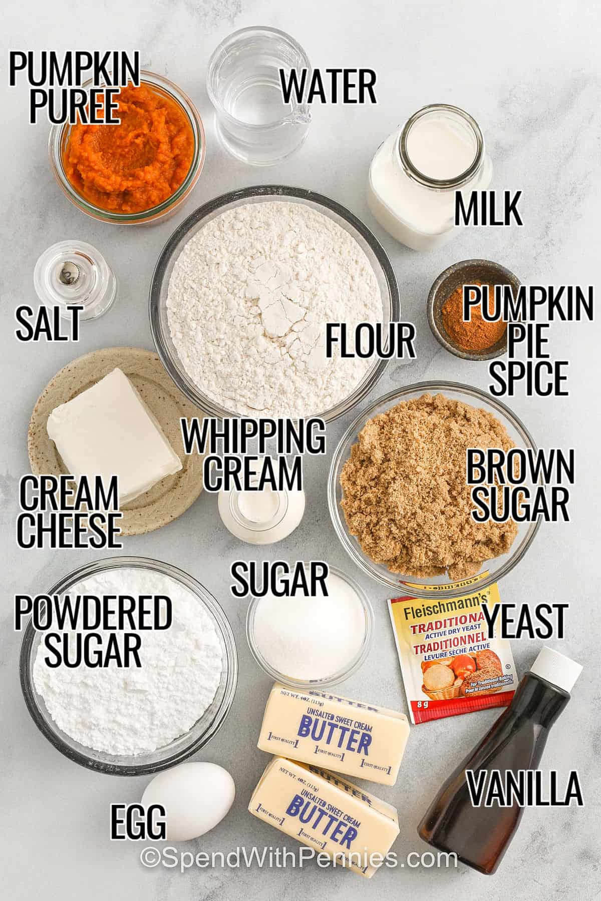 pumpkin puree , salt , water , cream cheese , powdered sugar , egg , butter , sugar , whipping cream , flour , vanilla , yeast , brown sugar , pumpkin pie spice and milk with labels to make Pumpkin Cinnamon Rolls