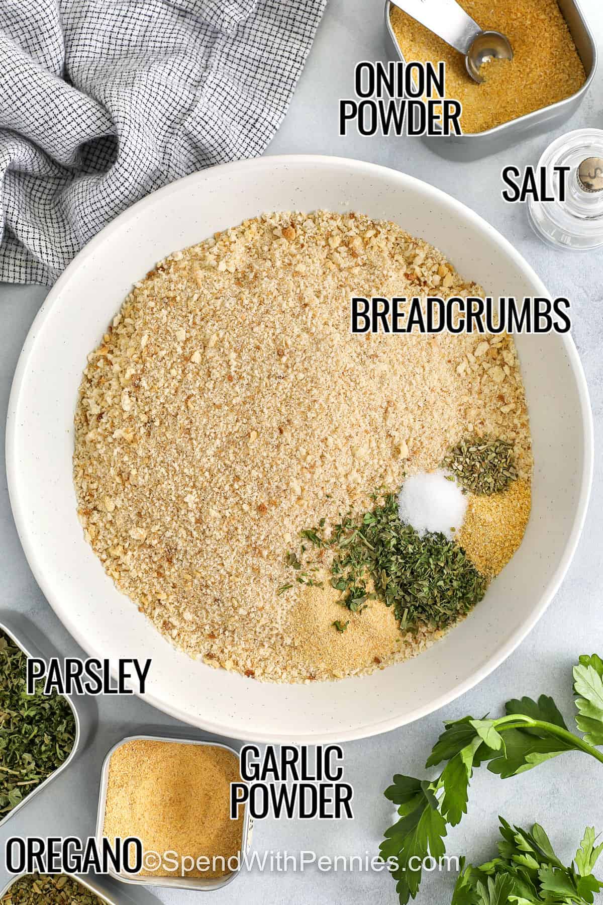 These seasoned bread crumbs are a pantry essential, combining garlic, onion, parsley, and oregano for bold, savory flavor. Perfect as a crispy coating or flavorful topping, they're easy to make at home using plain bread crumbs or panko and customizable to your taste. Store them at room temperature for up to two weeks, or freeze for longer storage. Great for adding flavor to casseroles, meatballs, or breaded chicken! #spendwithpennies onion powder , salt , breadcrumbs , parsley , garlic powder , oregano , parsley with labels to make Seasoned Bread Crumbs