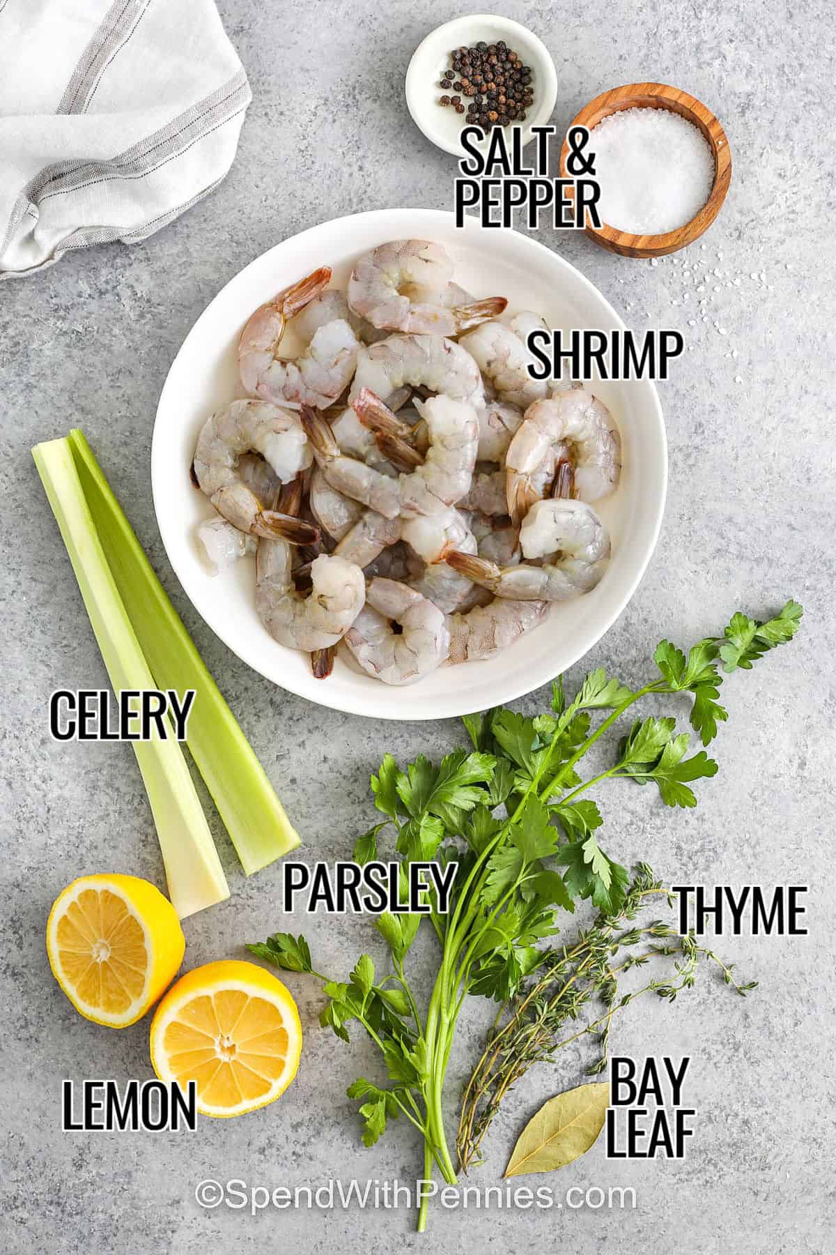 Shrimp cocktail brings bright, zesty flavor and an easy prep with this go-to party recipe. Jumbo shrimp are gently boiled with lemon and herbs, then chilled to keep the texture perfect. They’re served with cocktail sauce for dipping—just the way you want them. Great for holidays or gatherings, this is a classic you’ll want to make again and again. #spendwithpennies shrimp , celery , lemon , parsley , thyme , bay leaf , salt and pepper with labels to make Shrimp Cocktail