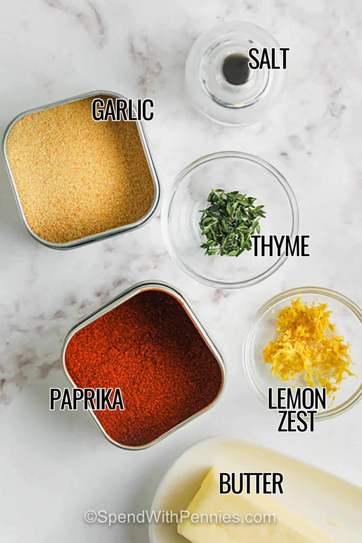 garlic , paprika , thyme , salt , lemon zest and butter to make Steak Butter with labels