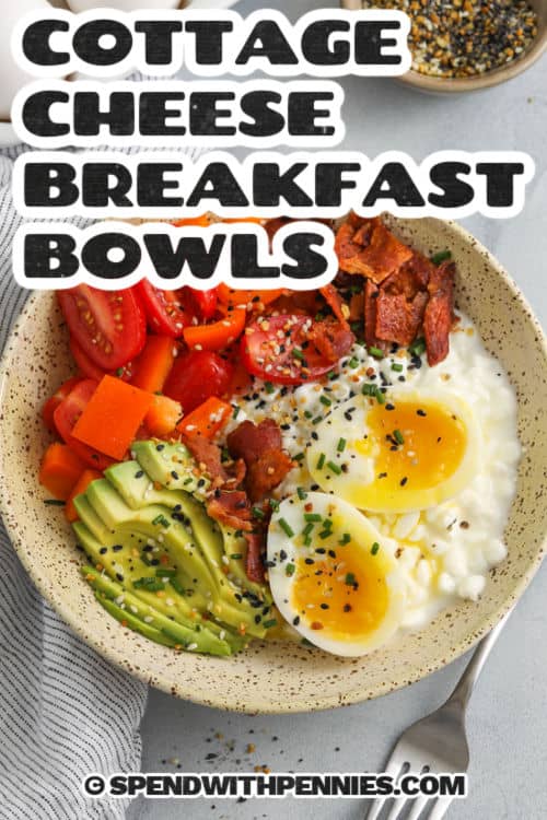 Cottage cheese breakfast bowls are a creamy, protein-packed way to start the day. These bowls are easy to customize with your favorite toppings. Perfect for busy mornings or a post-workout meal. Quick, healthy, and satisfying! #spendwithpennies Cottage Cheese Breakfast Bowls with crispy bacon and a title