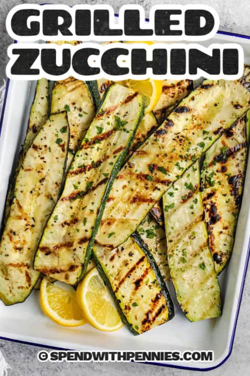 plate of Grilled Zucchini with lemon slices and a title