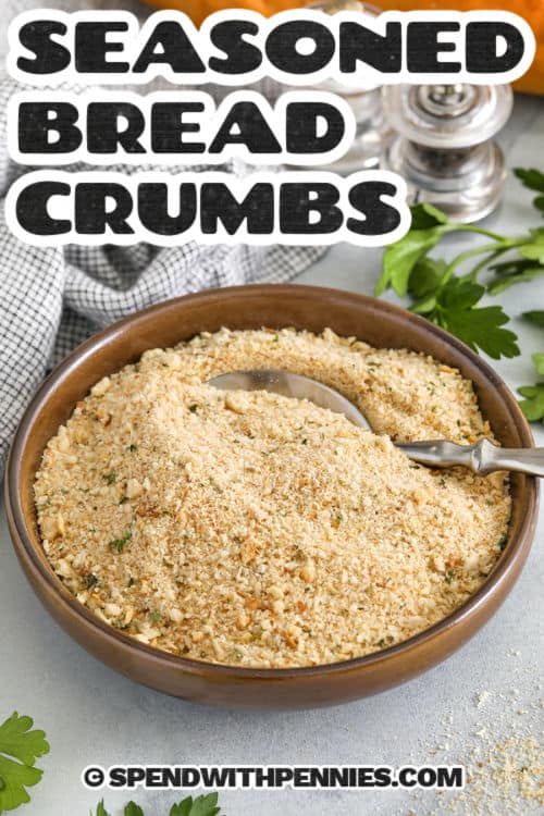 These seasoned bread crumbs are a pantry essential, combining garlic, onion, parsley, and oregano for bold, savory flavor. Perfect as a crispy coating or flavorful topping, they're easy to make at home using plain bread crumbs or panko and customizable to your taste. Store them at room temperature for up to two weeks, or freeze for longer storage. Great for adding flavor to casseroles, meatballs, or breaded chicken! #spendwithpennies plated Seasoned Bread Crumbs with a title