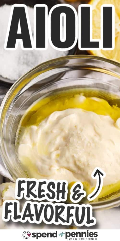 fresh and flavourful bowl of Aioli with lemon , garlic and salt around it with a title ingredients in bowl with writing