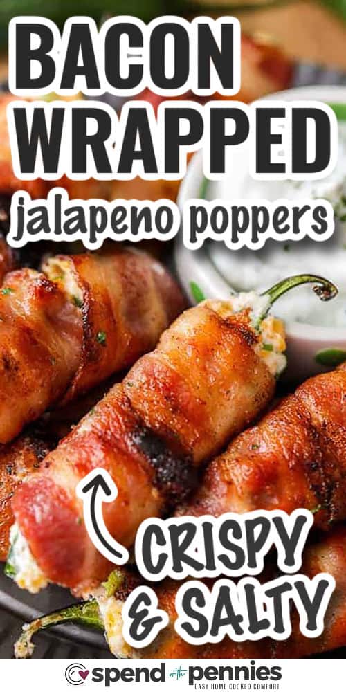 Bacon wrapped jalapeno poppers are a crowd favorite, offering creamy cheese filling with a fresh pop of green onion and a smoky bacon wrap. The recipe uses minimal ingredients and is easy to customize by adding more spices or swapping cheeses. Whether baked or grilled, these poppers crisp up beautifully while keeping the filling soft and flavorful. #spendwithpennies crispy and salty Bacon Wrapped Jalapeno Poppers with writing