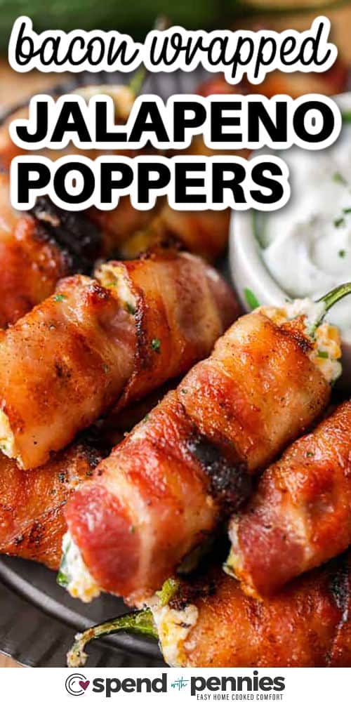 Bacon wrapped jalapeno poppers bring bold flavor with the perfect balance of spicy jalapenos and creamy cheese, wrapped in crisp bacon. The garlic powder and sharp cheddar enhance the filling’s richness without overpowering the pepper’s heat. Ideal as an appetizer or snack, they cook in under 30 minutes and require only simple kitchen skills. #spendwithpennies Bacon Wrapped Jalapeno Poppers on a plate with a title