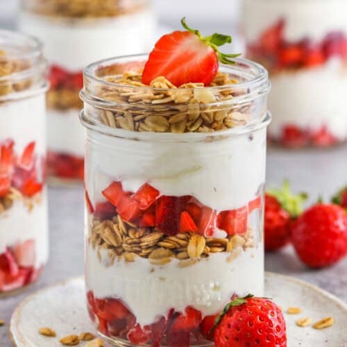jars of Strawberry Parfait with one on a plate