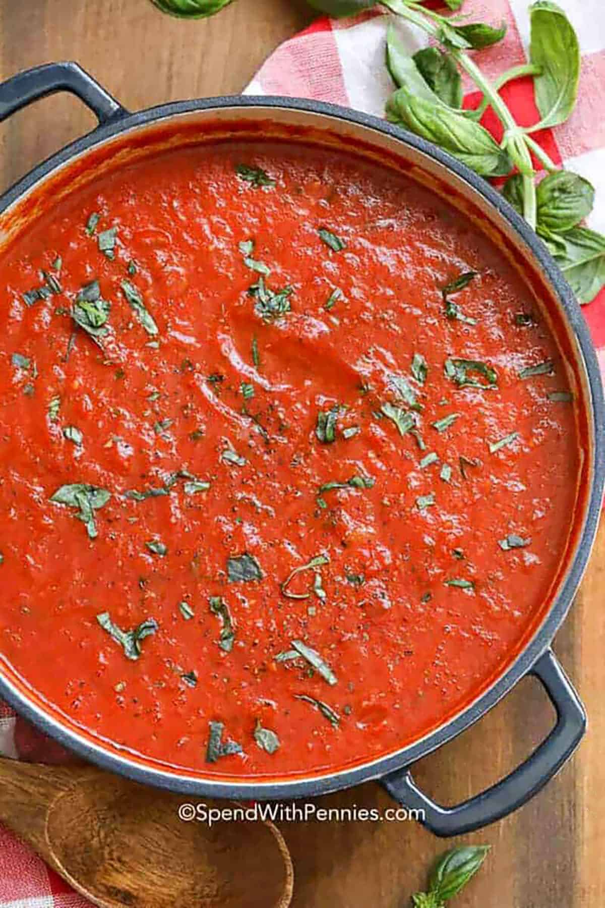 Easy marinara sauce is a quick and flavorful recipe that transforms simple ingredients into a rich, hearty sauce. Fresh onion, carrot, and garlic form the base before simmering with tomatoes, oregano, and basil. Whether topping spaghetti, layering into lasagna, or serving as a dip, it’s a staple that’s as versatile as it is delicious. #spendwithpennies Easy Marinara Sauce in a pot