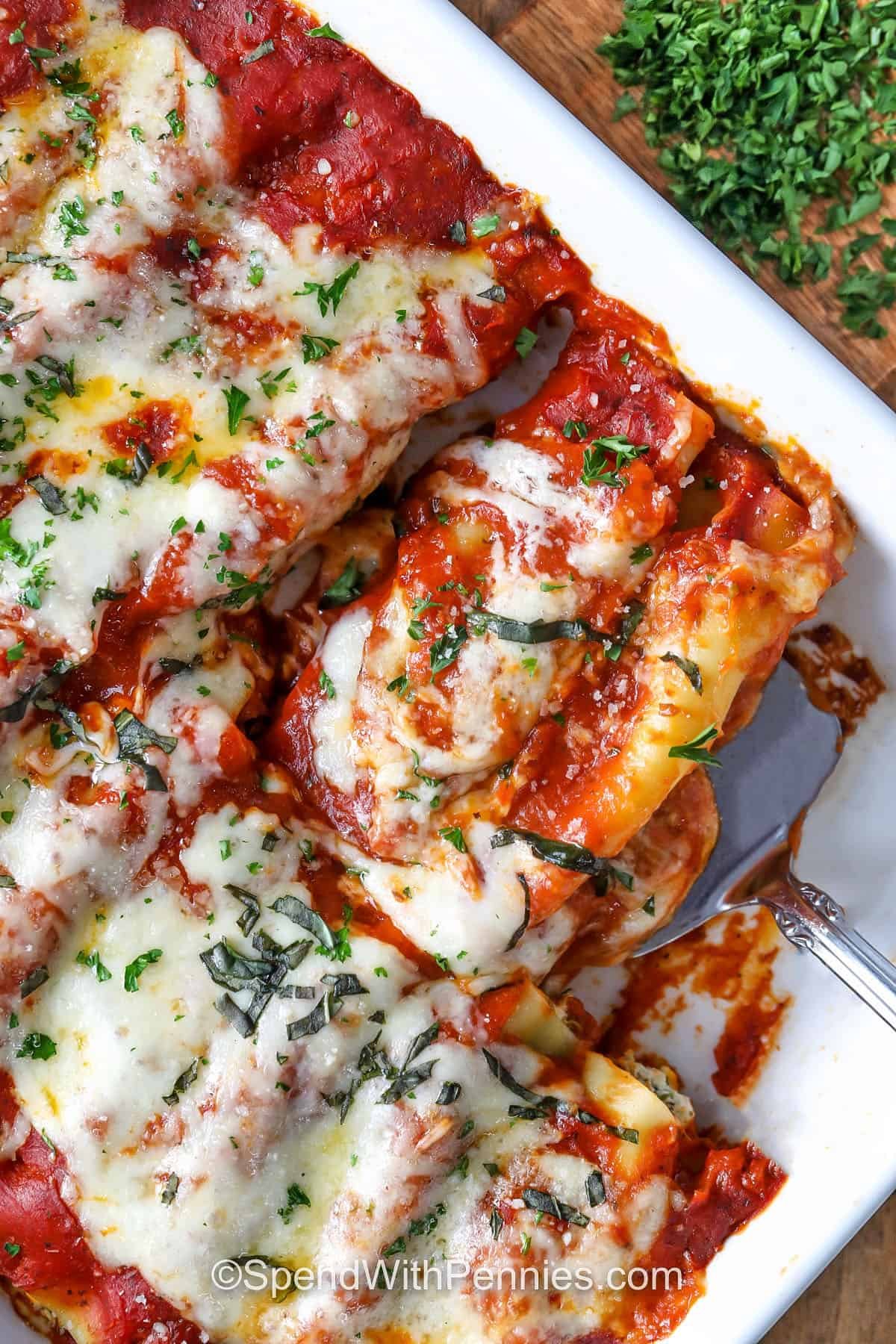 taking Cheese Cannelloni out of the casserole dish